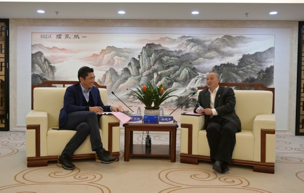 涂晓平会见福建闽海集团董事长丁剑扬一行